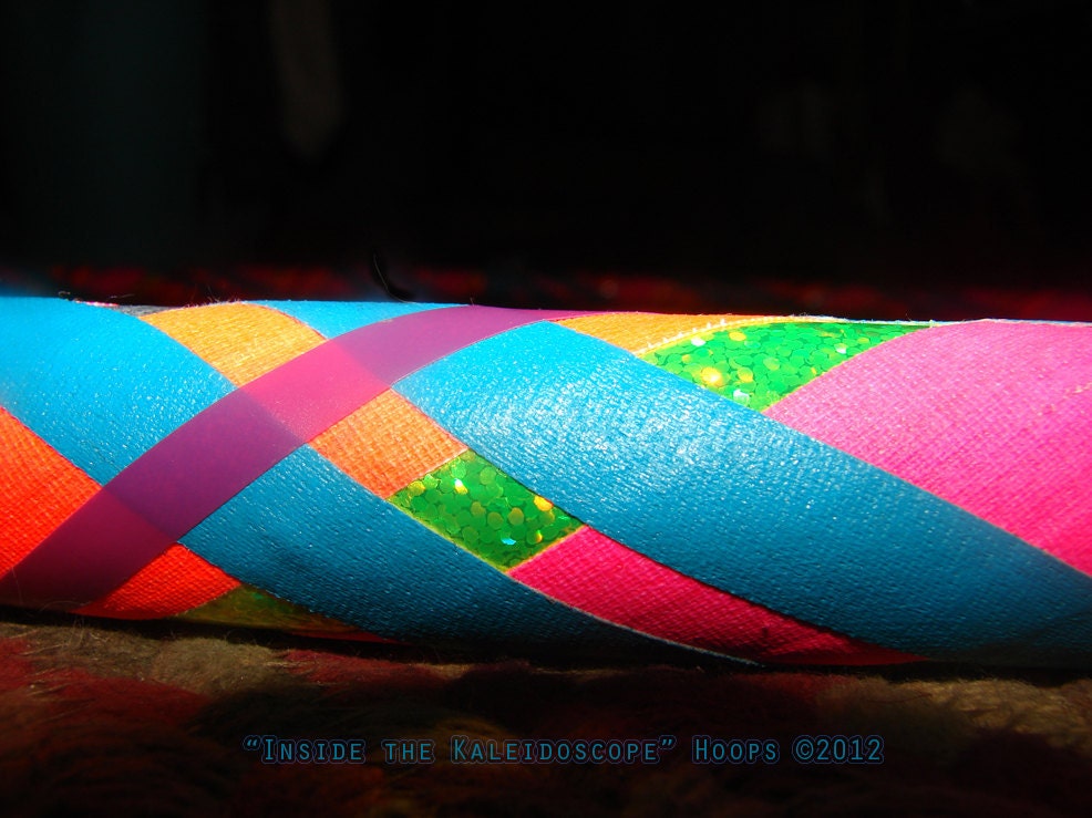 Collapsible Hula Hoop: Plaid Pattern with a rainbow of hot colors and sparkle. Super fun combo.