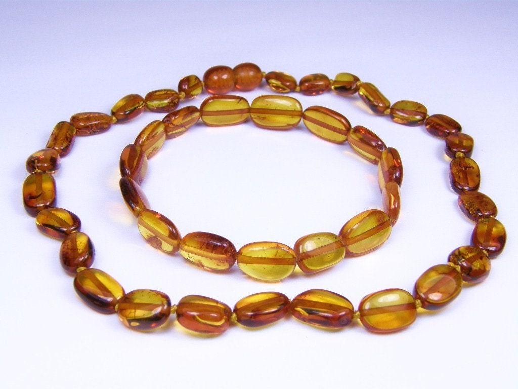 Olive shape Cognac amber teething necklace and mothers reminder bracelet.