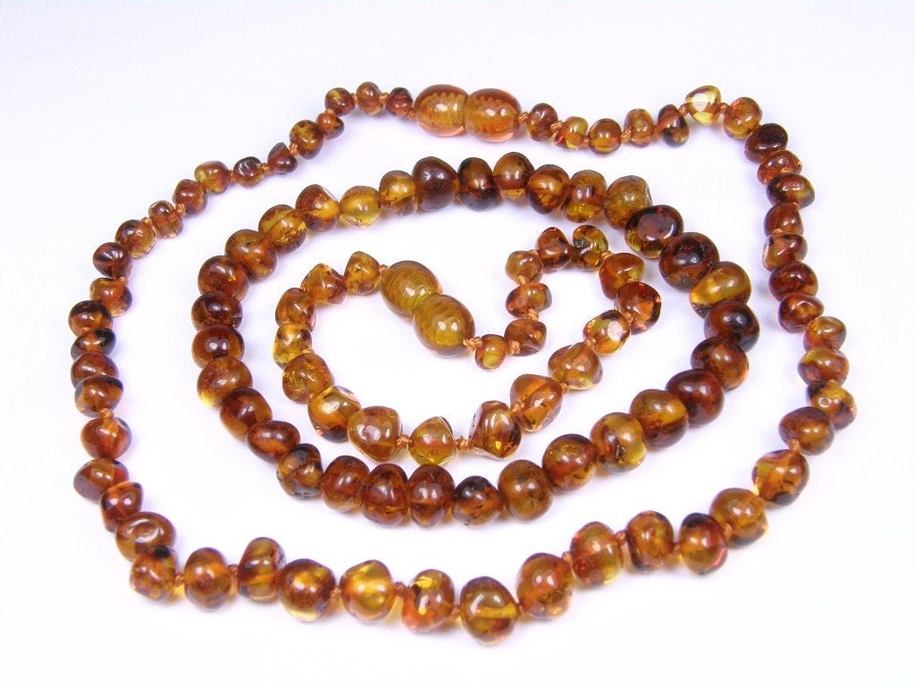 Baroque beads cognac amber teething necklace, baby bracelet and mothers reminding bracelet.