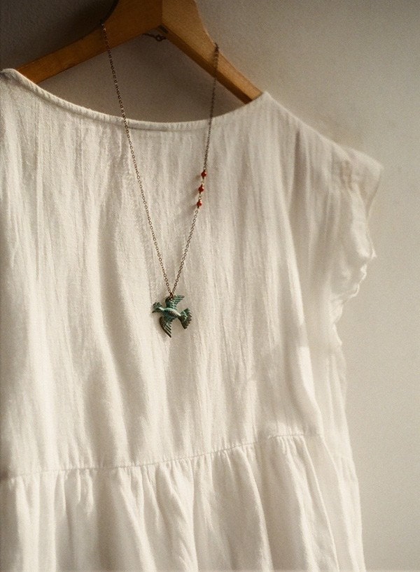 Magical bird - verdigris patina and coral beads asymmetrical necklace