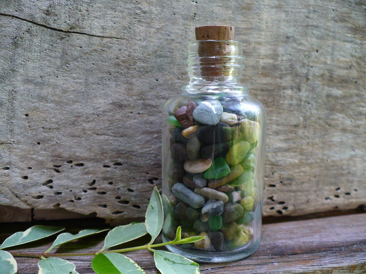 BEACH BOTTLE...a glass bottle filled with beach finds, sea glass, pebbles