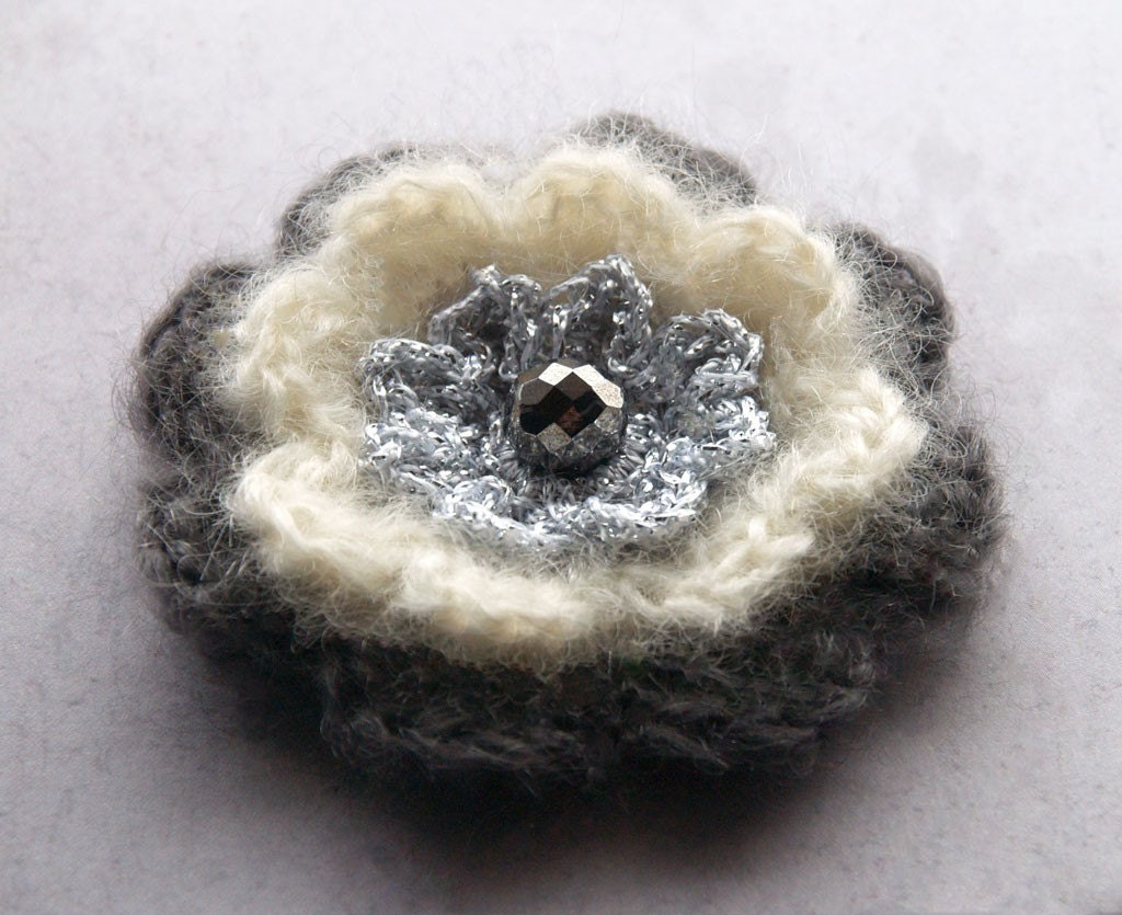 Crochet flower brooch in charcoal, ivory and silver