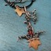 Copper Ivy Leaf and Vine Necklace with Garnets on Black Leather Cord