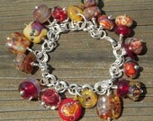 Friendship 3....multi-artist lampwork charm bracelet