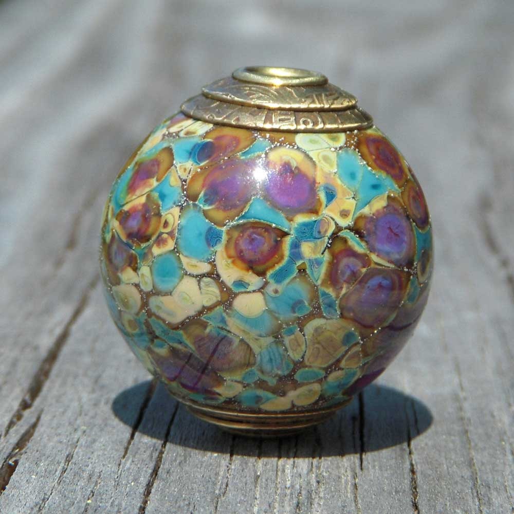 Lampwork focal bead, pendant, brass capped and cored, purple, turquoise, tan, "Adobe"