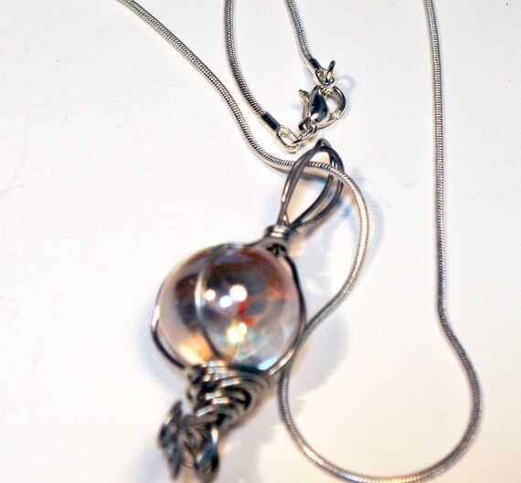 Items similar to Clear Marble Silver Wire Wrapped Necklace on Etsy