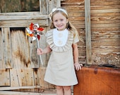 Retro Layla in light tan linen with lace bib and ruffles-children clothing
