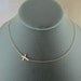 Sideways Gold Cross Necklace- Off Center