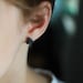 Tiny Triangle post earrings in Black