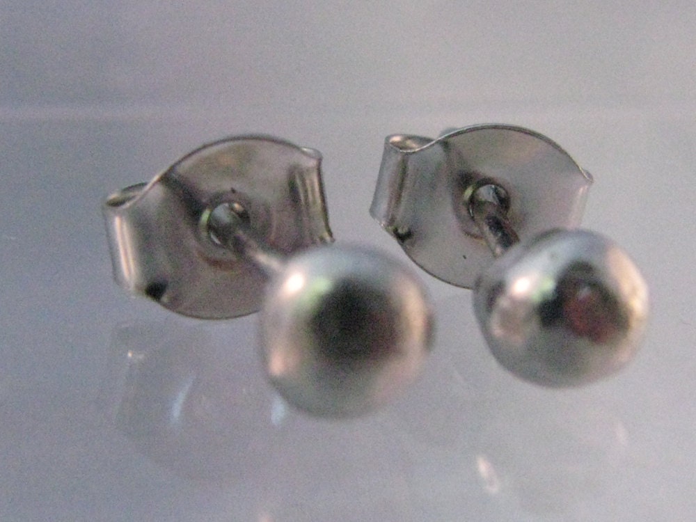 Platinum Stud Earring. Just One Stud.