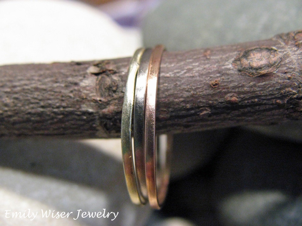 Tiny rose gold stack ring. Tiny green gold stack ring. Tiny white gold stack ring. or Tiny yellow gold stack ring. PICK 2