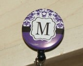 ID reel with MYLAR covering....Purple Damask ...CHOOSE your letter