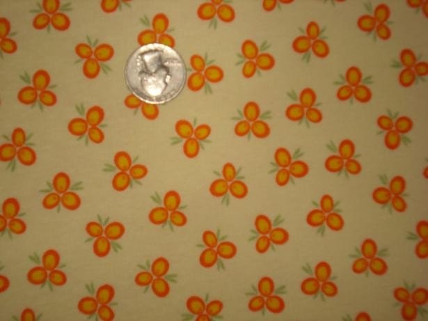 Pretty Peach flowers on a Sweet Yellow Cotton Rib Knit Fabric
