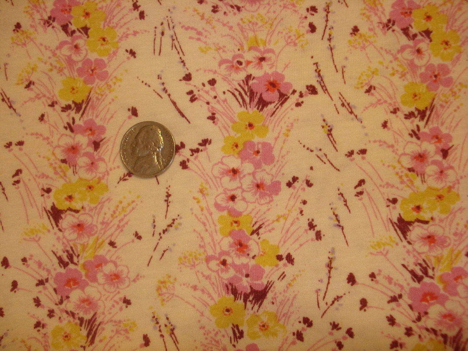 Pretty vertical flowers in a row on cotton lycra knit fabric 1 YD