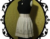 vintage brown gingham apron. hand-stitching and pleats.