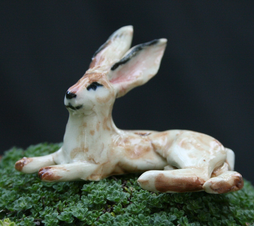 rabbit figurine - resting jack - porcelain animal figurine