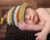 boy's knit hat with colourful stripes.  size newborn or infant.