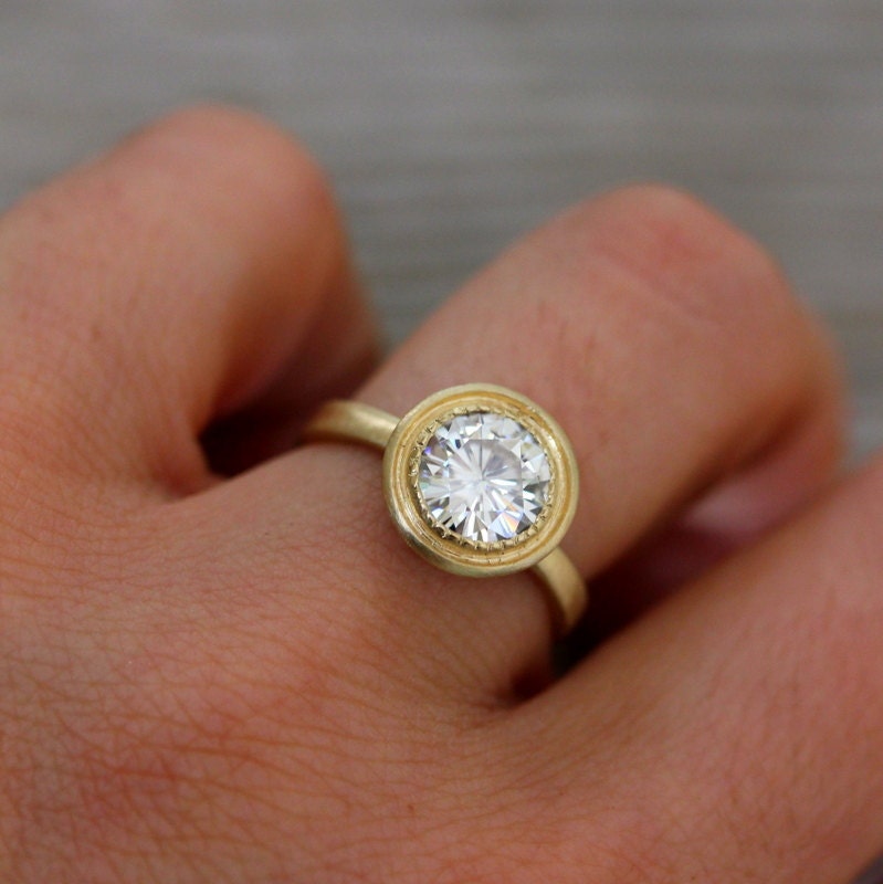 Moissanite and 14k Yellow Gold Engagement Ring, Matte Gold and MIlgrain Textured Bezel