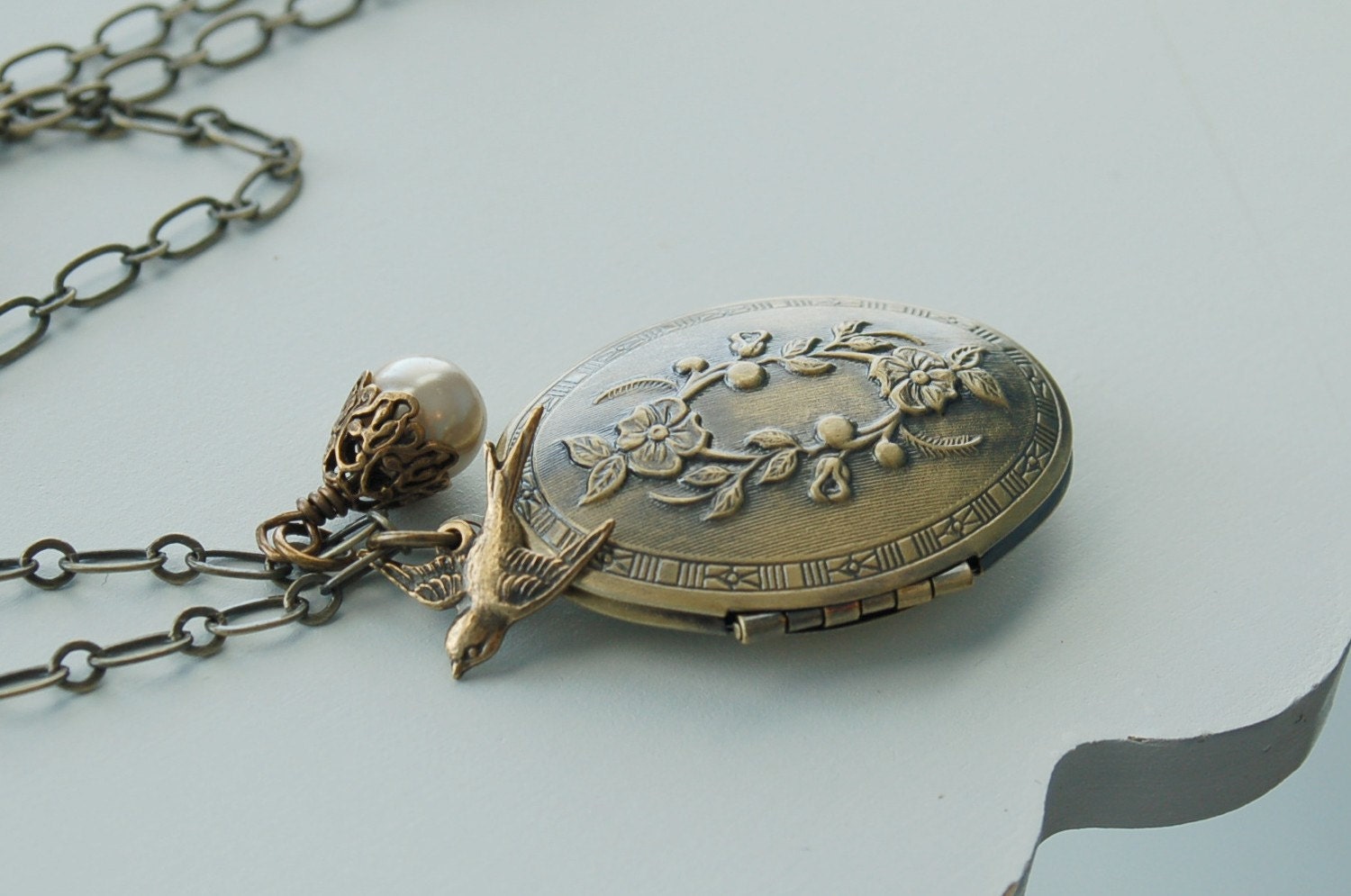 Secret Garden Locket - Antique brass and champagne pearl with bird