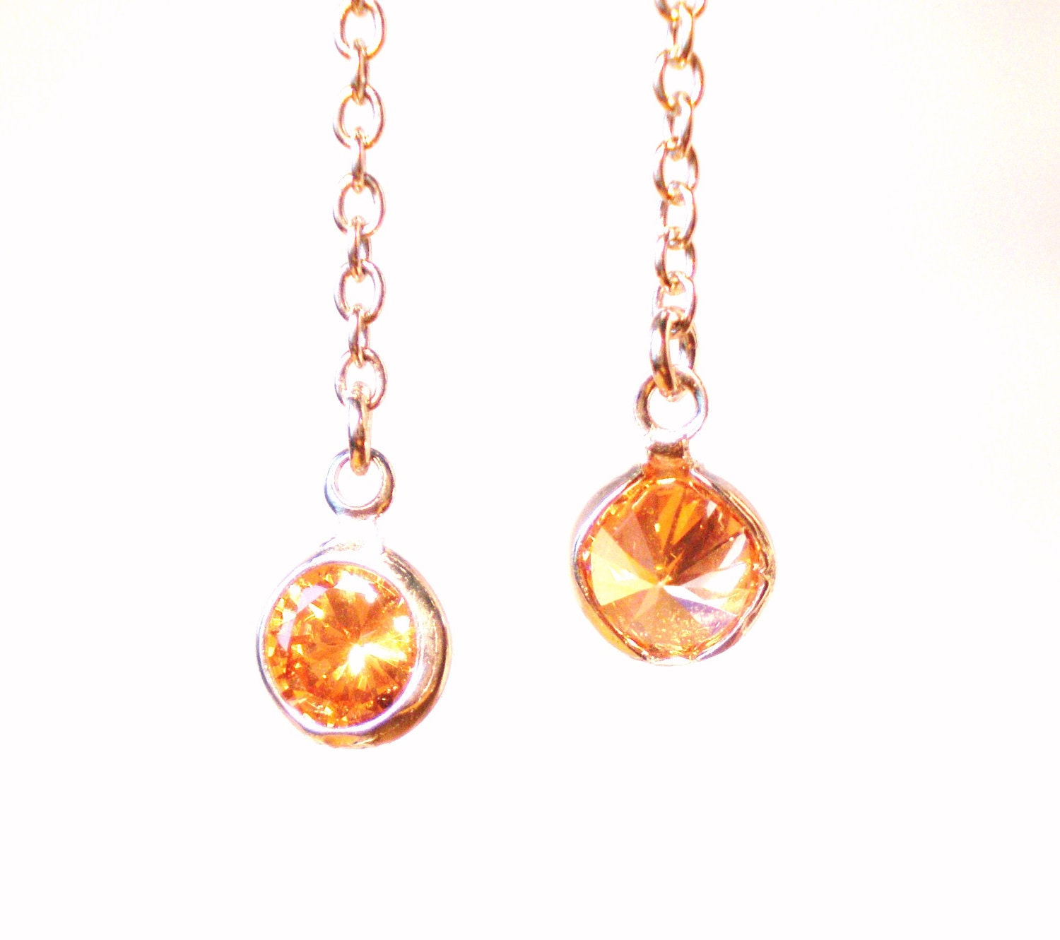 simple earrings with light brown (amber color) zircon