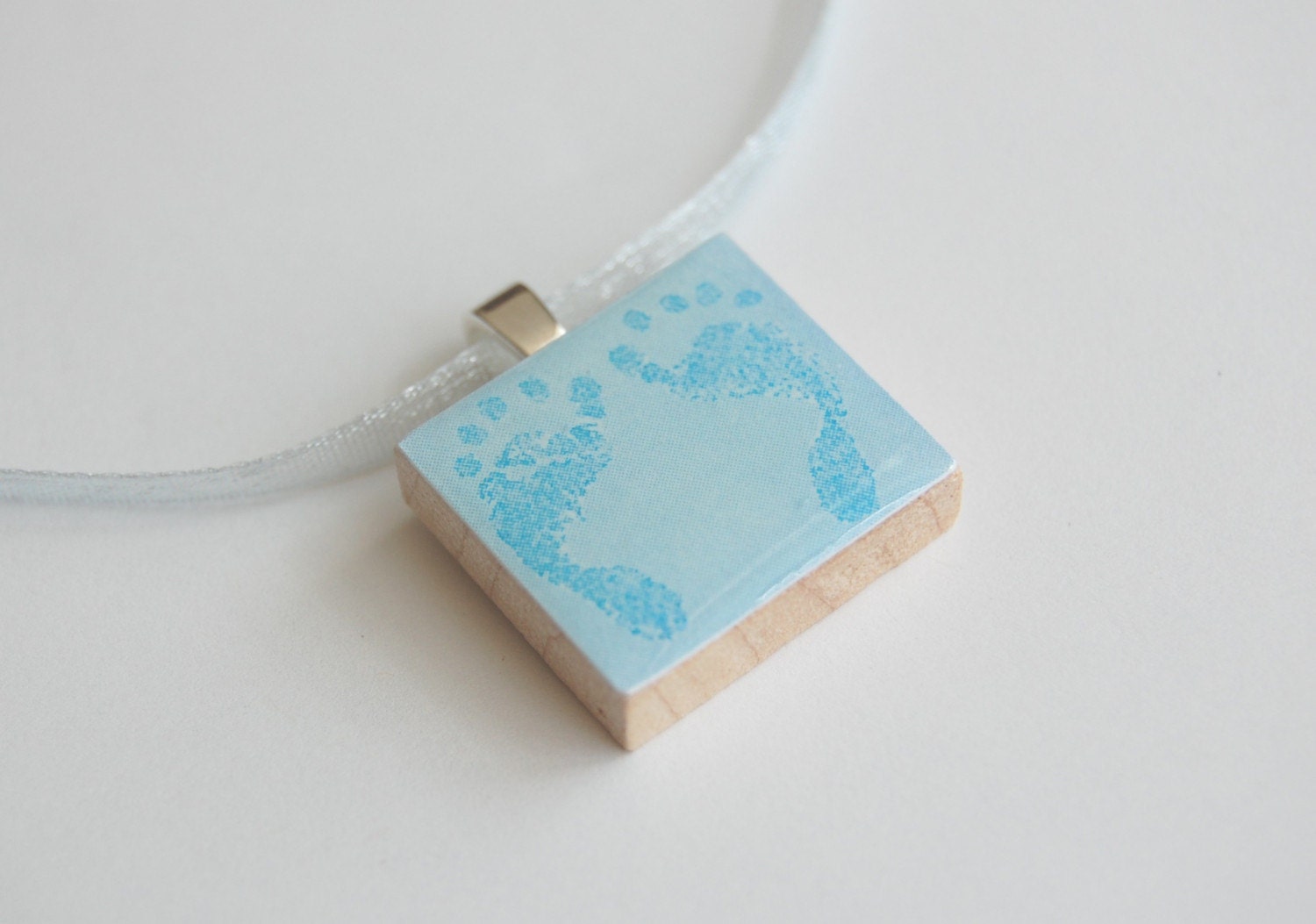 SALE -- Tiny Toes Baby Blue Footprints pendant