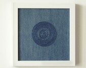 Hand sewn abstract denim embroidery