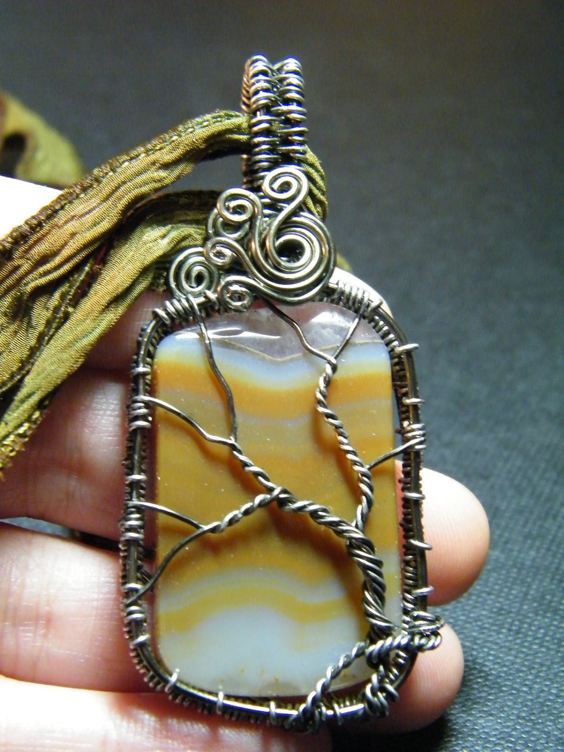 Tree Of Life: Woven wire TreeOf Life on an Agate slice with a hand dyed silk ribbon, necklace