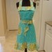 Fabulous with Ruffles Full Apron . . . leaf confetti and spring bud aqua print