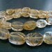 1/2 Strand---AAA--Golden Rutilated Quartz Faceted Nuggets---LAST STRAND