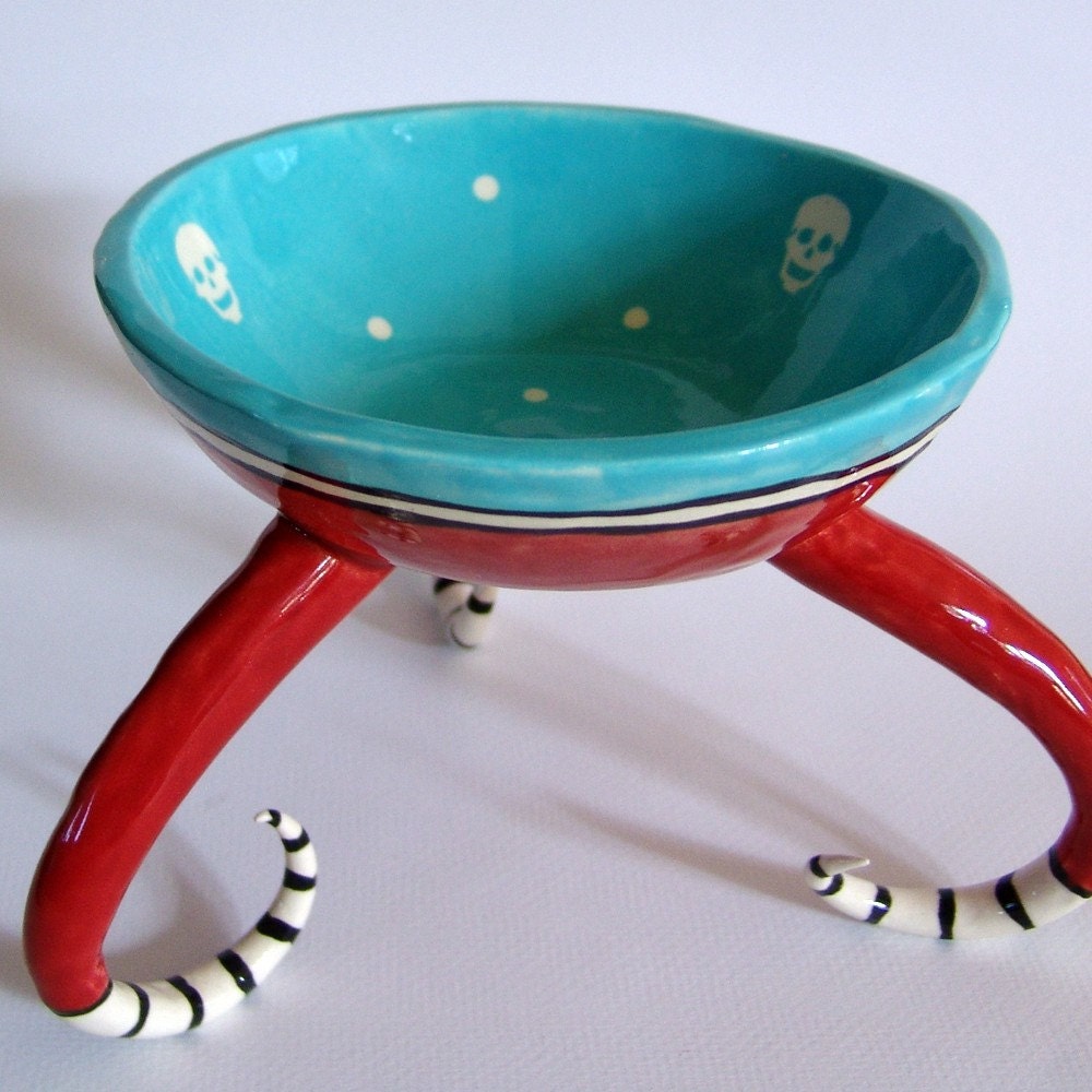 ceramic serving bowl with funky stripes & skulls