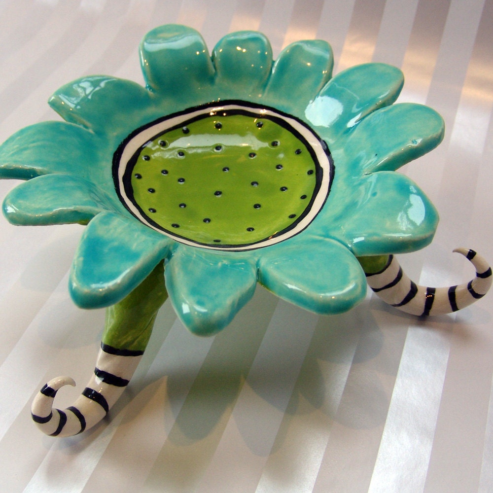 colorful soap dish with kooky striped legs