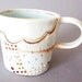 porcelain cup with translucent bottom