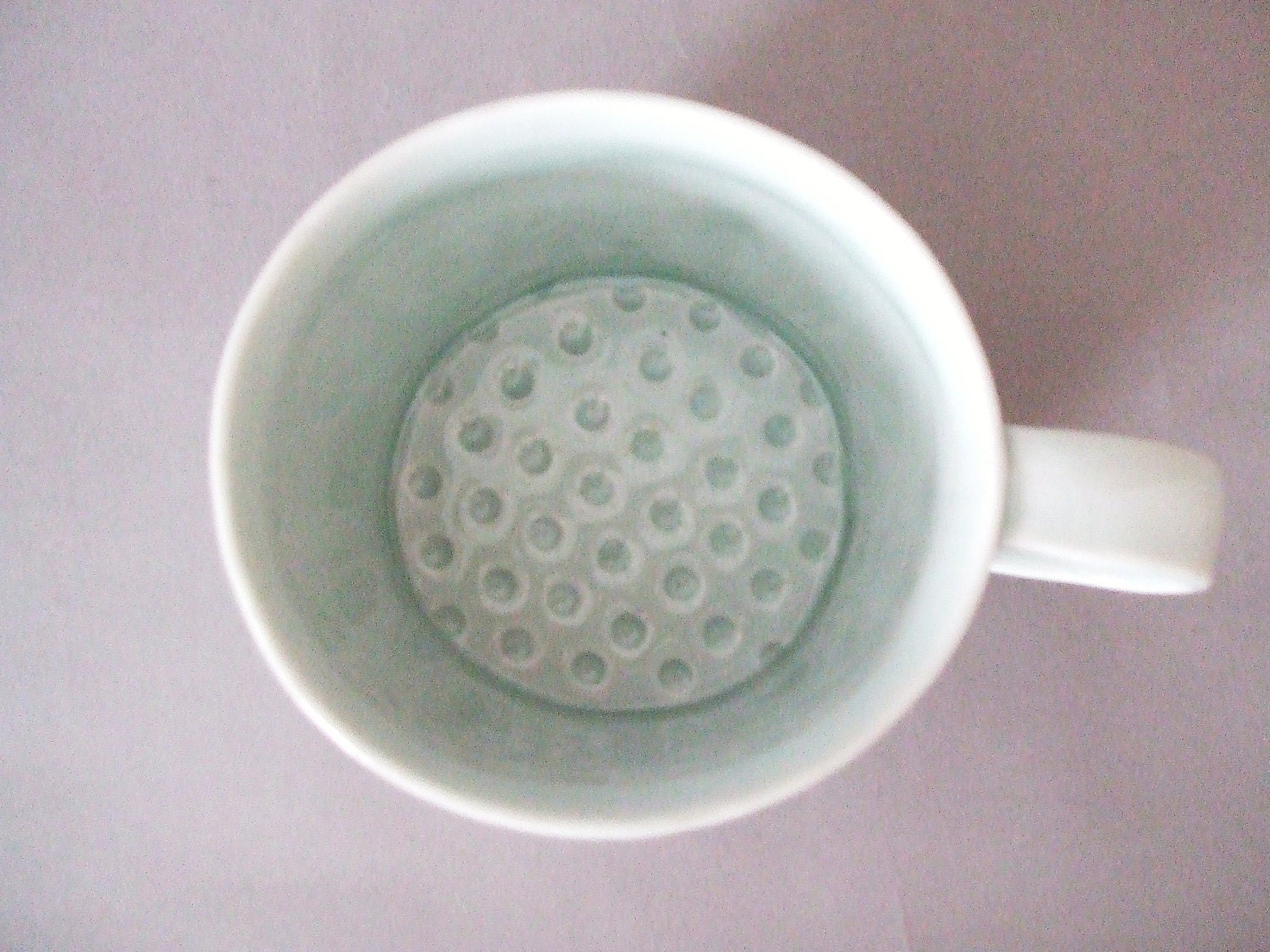 porcelain cup with translucent bottom