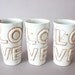Tall porcelain tumbler with translucent bottom