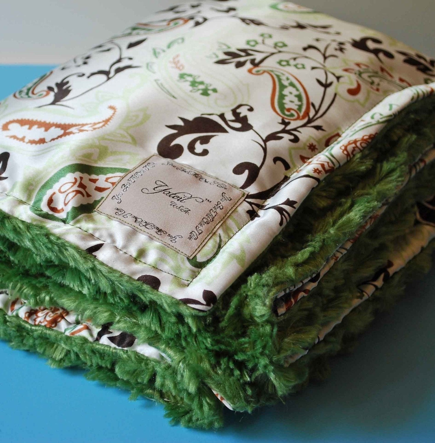 AYAAN BABY BLANKET.........Green and Black paisley Silky Satin with Green minky swirls...... Luxury for boys