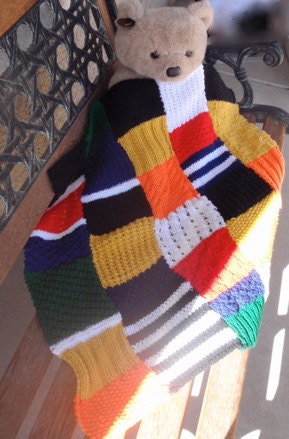 Multi color, patchwork, hand knitted baby blanket for a boy or a girl