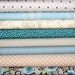fat quarter bundle (wintery blues)--misc. designers--8 pieces--2 yards total