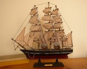 Vintage Model Ship with Anchor and Striped Sails