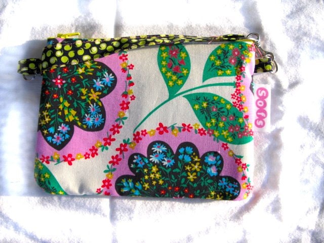 Sofs offers a wristlet in total retro girl.