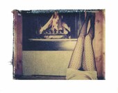 11x14 polaroid transfer of legs next to fireplace-signed by artist