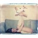 4x5 angelic polaroid transfer of girl with toy plane in 8x10 mat- signed by artist