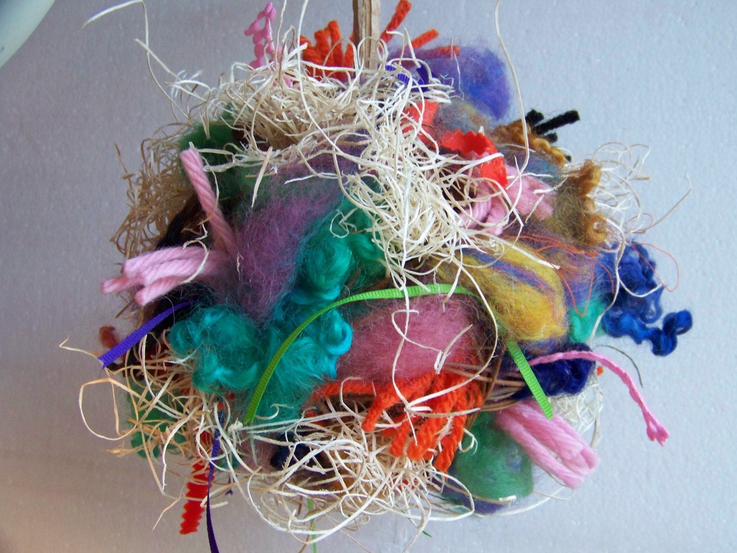 Medium Size Bird Giving Ball Nesting Materials for by Bugtussle