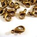 25 Antique Bronze Lobster Clasps Plated Alloy 10x6mm - 25 pc - F4007LC-AB10-25