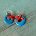 Hoops and bows sterling silver earrings