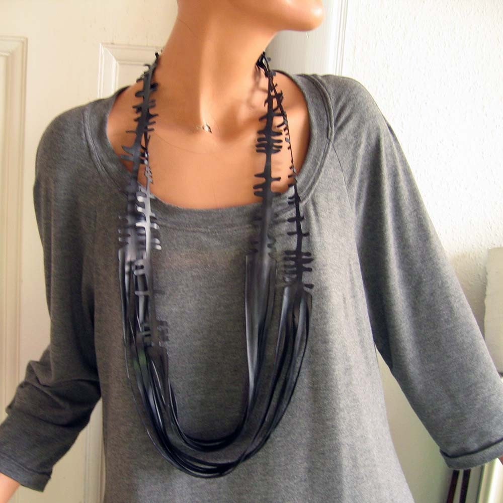 Recycled bicycle inner tube necklace handcut out of one piece.