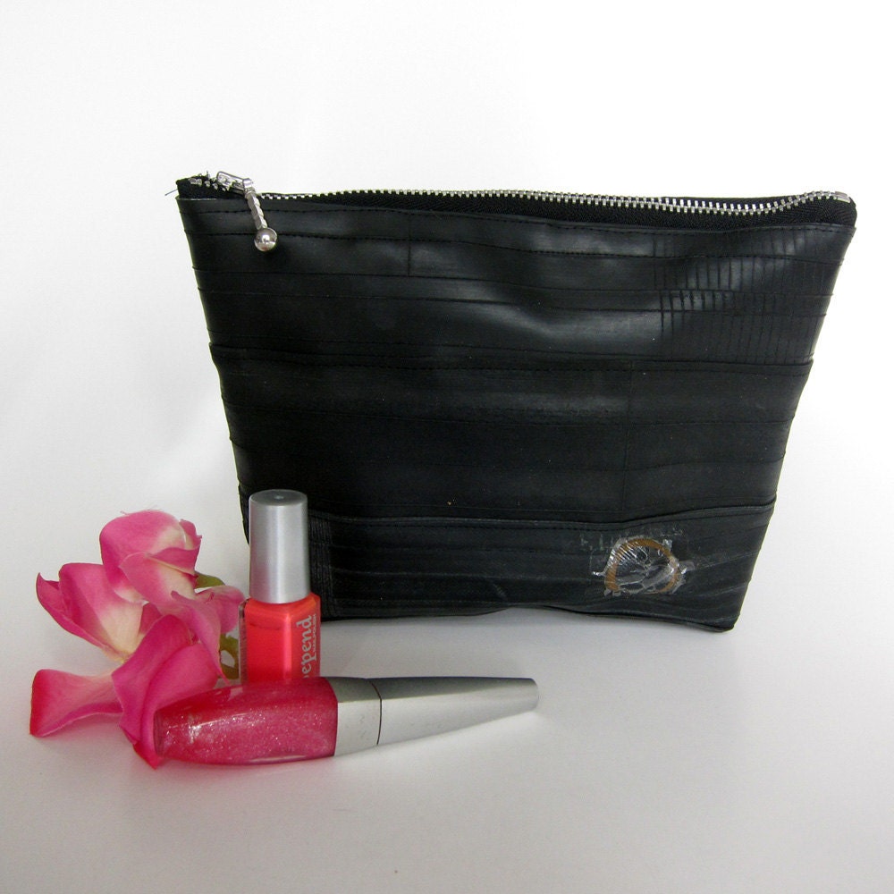 Black recycled bike inner tube cosmetic bag with patch.
