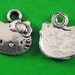 Hello Kitty Head Charms lot of 10 - LAST CHANCE CLEARANCE