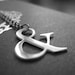 Ampersand Necklace Silver Tone Polished Stainless Steel Typography Necklace