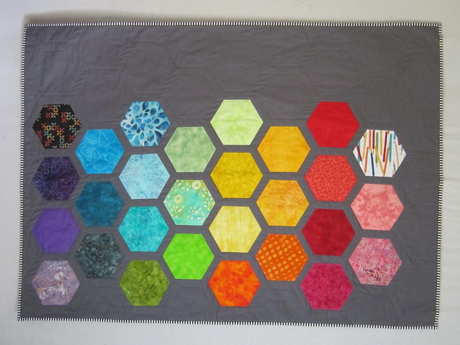 Big Bold Baby Hexagons Quilt from Quilts by Elena Modern gray background with bright appliqued hexagons Wall Hanging Ready to Ship