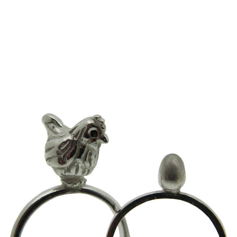 Chicken and Egg Rings. Silver with black diamond eyes.